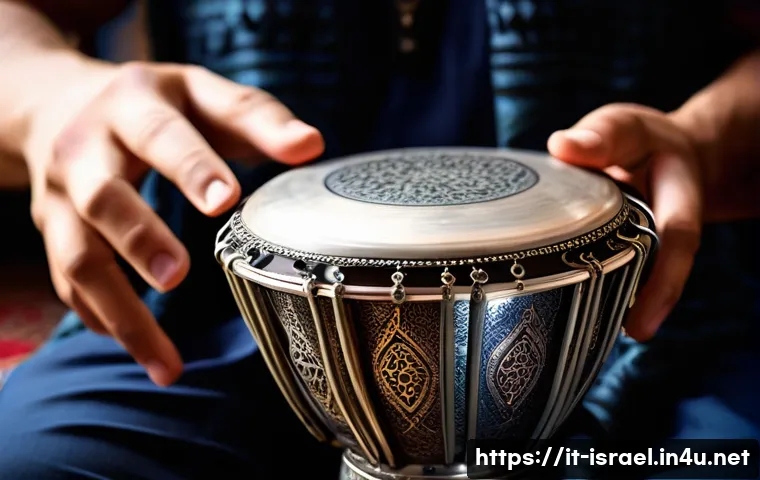 이스라엘 전통음악 악기 연주법 - A detailed close-up image of a darbuka drum made of shiny metal with intricate engraved patterns, re...